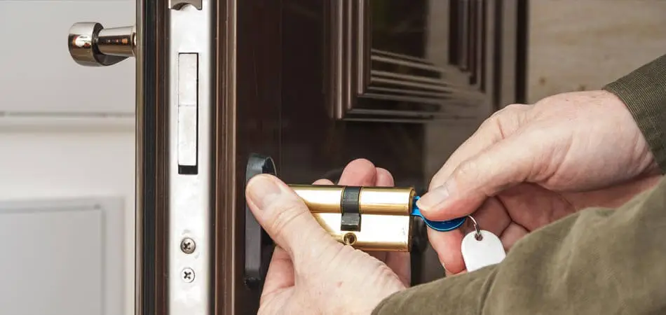 Locksmith unlocking a homeowners door after they locked their keys in the house in Largo, FL